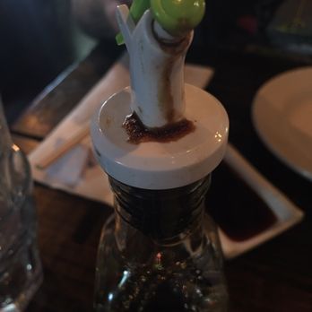 Zu Izakaya - Soy sauce container with dried up soy sauce - Asian Fusion Near Me - Tempe, Arizona