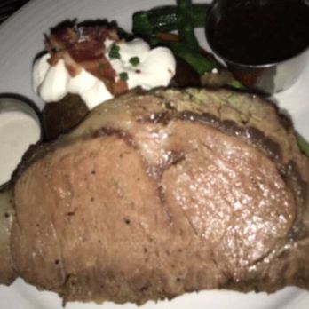 Orange Hill Restaurant & Events - Herb Roasted Prime Rib with baked potato and veggies - Steakhouses Near Me - Orange, California Orange Hill Restaurant & Events - Herb Roasted Prime Rib with baked potato and veggies - Steakhouses Near Me - Orange, California