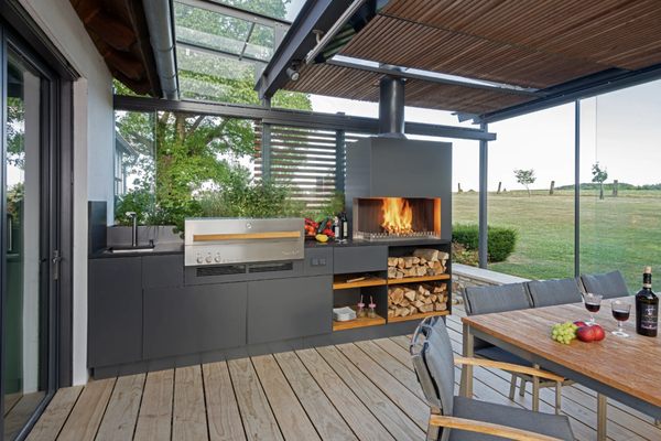Outdoor Kitchens & More! - An outdoor kitchen is a fully functional cooking and entertainment space designed to enhance your outdoor living experience. Custom-built to suit your needs, it typically includes features such as built-in grills, countertops, sinks, storage cabinets, refrigerators, and seating areas. High-quality materials, such as weather-resistant stone, stainless steel, and durable wood, ensure longevity and aesthetic appeal. Whether designed for casual family gatherings or large-scale entertaining, an outdoor kitchen provides convenience, style, and added value to your home while allowing you to enjoy cooking and dining in the open air. Outdoor Kitchens & More! - An outdoor kitchen is a fully functional cooking and entertainment space designed to enhance your outdoor living experience. Custom-built to suit your needs, it typically includes features such as built-in grills, countertops, sinks, storage cabinets, refrigerators, and seating areas. High-quality materials, such as weather-resistant stone, stainless steel, and durable wood, ensure longevity and aesthetic appeal. Whether designed for casual family gatherings or large-scale entertaining, an outdoor kitchen provides convenience, style, and added value to your home while allowing you to enjoy cooking and dining in the open air.