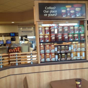 Tim Hortons - a coffee shop with a counter and a sign that says coffee out place or yours - Coffee & Tea Near Me - Richmond Hill, Ontario Tim Hortons - a coffee shop with a counter and a sign that says coffee out place or yours - Coffee & Tea Near Me - Richmond Hill, Ontario