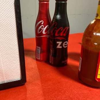 Dairy Delight - two bottles of coke and a picture frame - American Near Me - Pleasant Hill, Louisiana Dairy Delight - two bottles of coke and a picture frame - American Near Me - Pleasant Hill, Louisiana