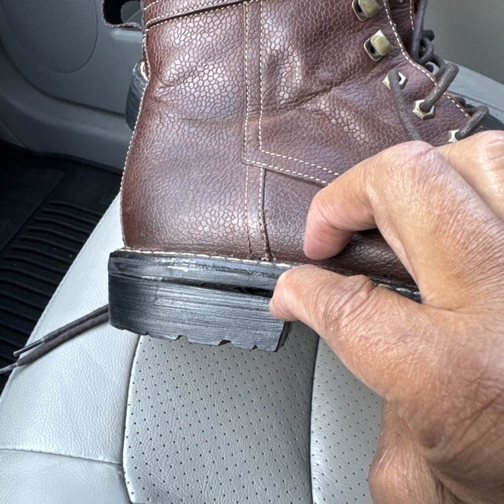 Shoe Express Repair - Looks like no work was done. This is the result of him breaking the heel from the sole. This is what he calls finished work. - Shoe Stores Near Me - Overland Park, Kansas