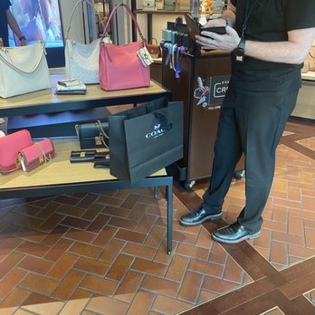 Coach - The alarm in my wallet went set off the alarm.. Andrew removed it - Outlet Stores Near Me - Arlington, Virginia