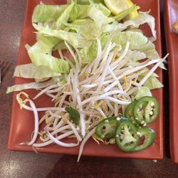 Saigon Pho - the garnish that you can choose to go into your pho! I'm unsure about the lettuce.. not sure if that's typical garnish, but it was pleasant!