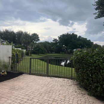 All Around Groundkeepers - Restored our lake view by cutting back overgrown shrubs - Tree Services Near Me - Margate, Florida