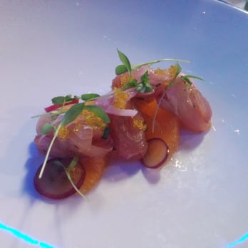 KUU Restaurant - Kanpaccio16 kanpachi, texas orange, yuzu, garlic soy, thai chili - Japanese Near Me - Houston, Texas