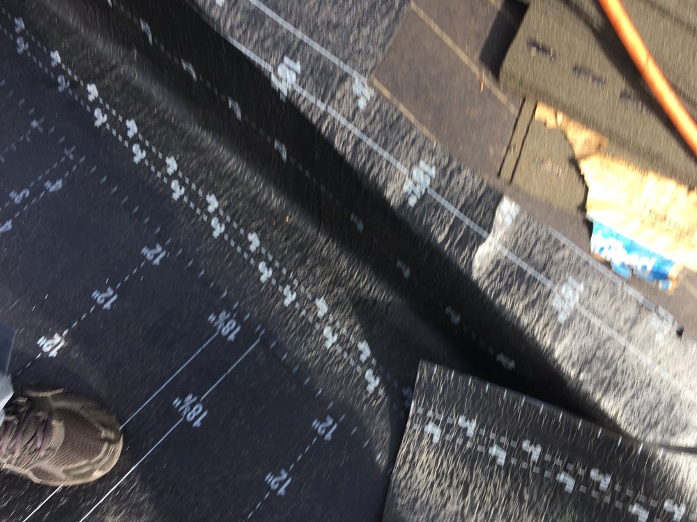 Slide of Paradise Roofing