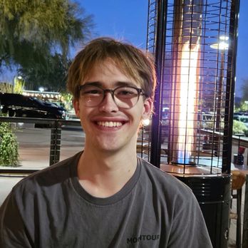 La Cocina - Authentic Mexican Kitchen - Cole after getting his hair all cut with the space heater behind him - Mexican Near Me - Scottsdale, Arizona
