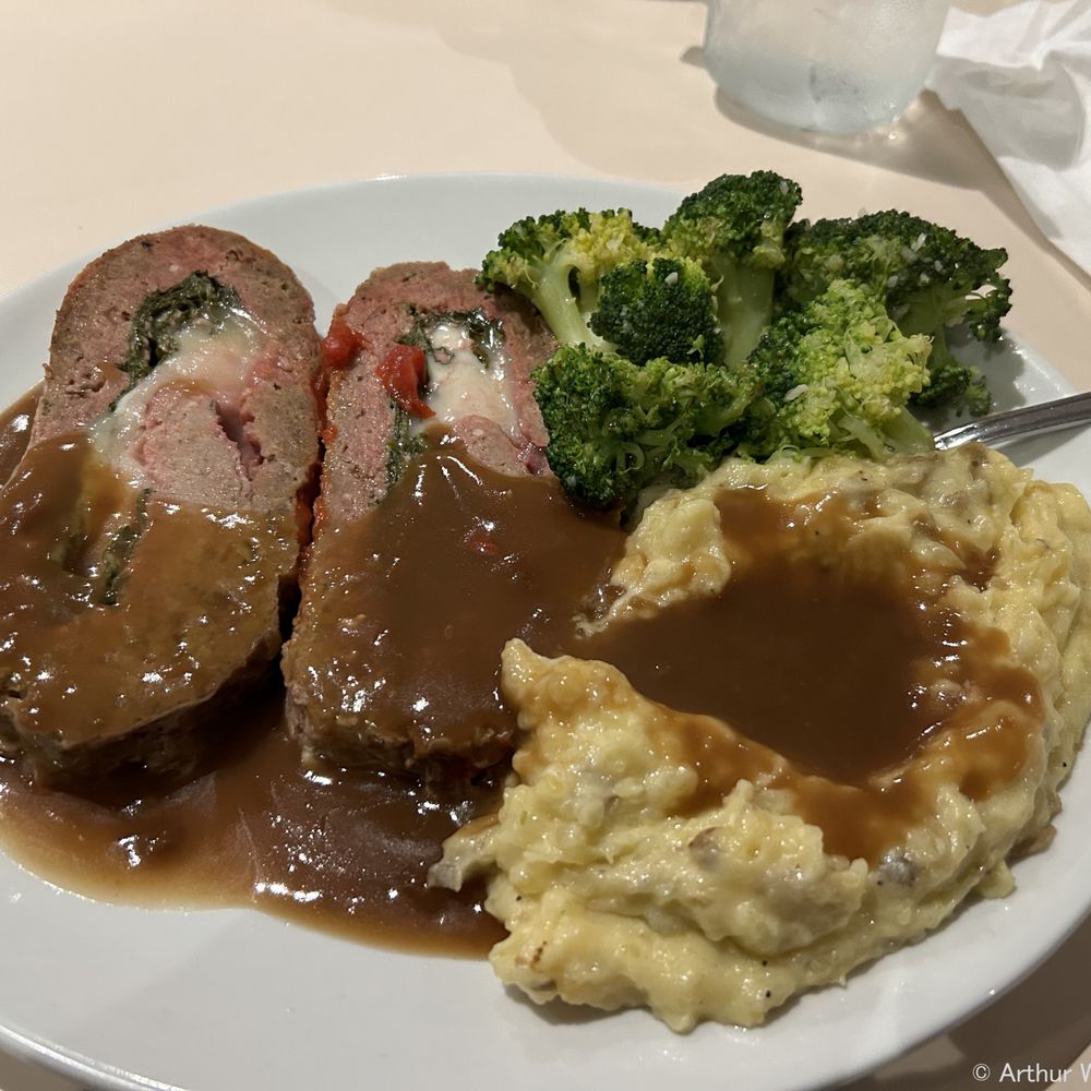 Back Home Restaurant and Bar - Meatloaf with Spinach and Cheese Inside - Comfort Food Near Me - Greenacres, Florida Back Home Restaurant and Bar - Meatloaf with Spinach and Cheese Inside - Comfort Food Near Me - Greenacres, Florida