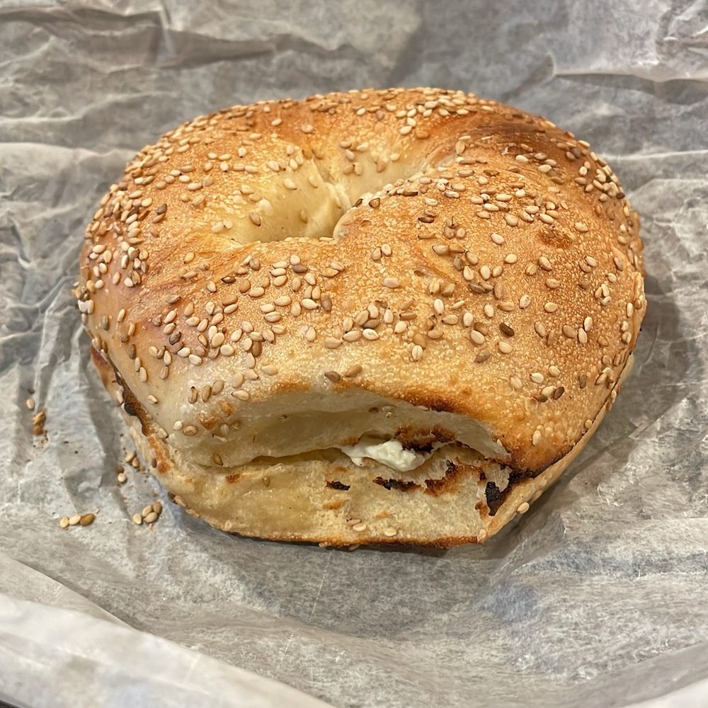 Sesame bagel with cream cheese Sesame bagel with cream cheese