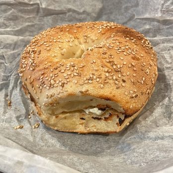 Village Bagel - Sesame bagel with cream cheese - Bagels Near Me - Syosset, New York Village Bagel - Sesame bagel with cream cheese - Bagels Near Me - Syosset, New York