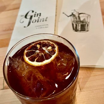 The Gin Joint - THE RODEO CLOWN - Bourbon, Amaros, Cap Corse Rouge, Alder Wood, Kola, BBQ Bitters - Cocktail Bars Near Me - Charleston, South Carolina The Gin Joint - THE RODEO CLOWN - Bourbon, Amaros, Cap Corse Rouge, Alder Wood, Kola, BBQ Bitters - Cocktail Bars Near Me - Charleston, South Carolina