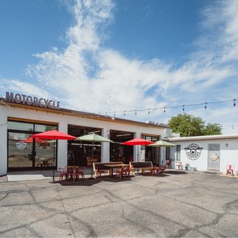 Gear Shifters - the outside of a restaurant with tables and umbrellas - Motorcycle Dealers Near Me - Tucson, Arizona