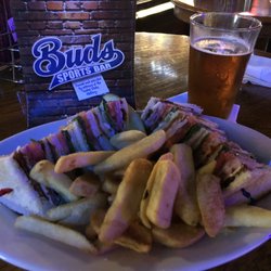 Bud's Sports Bar - Club sandwich with steak fries and a pint of Yuenling.