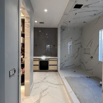 B & B Flooring - a bathroom with a walk in shower - Flooring Near Me - Victorville, California B & B Flooring - a bathroom with a walk in shower - Flooring Near Me - Victorville, California