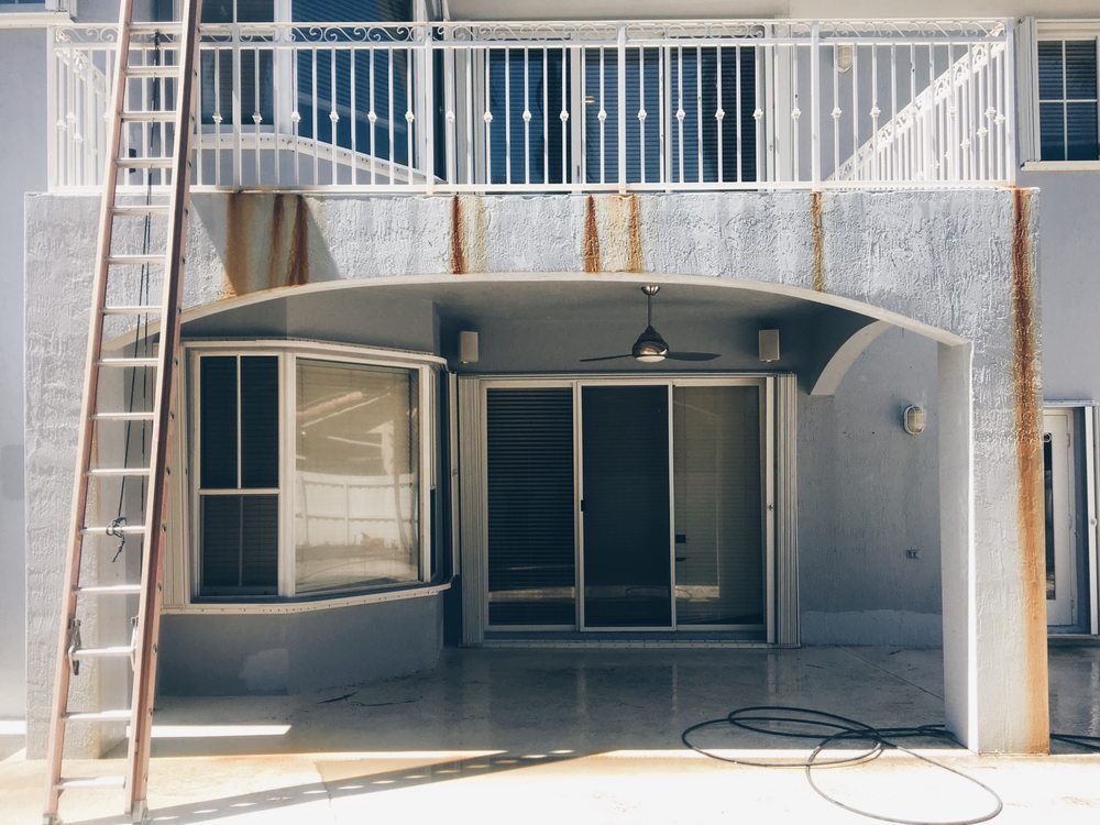 Slide of Miami Roof Cleaning Services