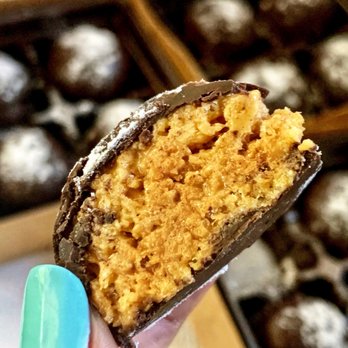 Sugar and Spice - Take a peek inside these crazy good peanut butter balls! - Custom Cakes Near Me