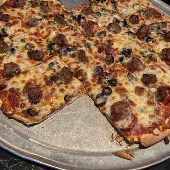 Maricio's in Barton - Pizza with extra cheese which - Italian Near Me - West Bend, Wisconsin