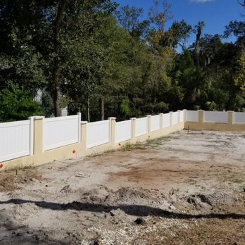 Bryant Infrastructure - a view of a fenced in yard - General Contractors Near Me Bryant Infrastructure - a view of a fenced in yard - General Contractors Near Me