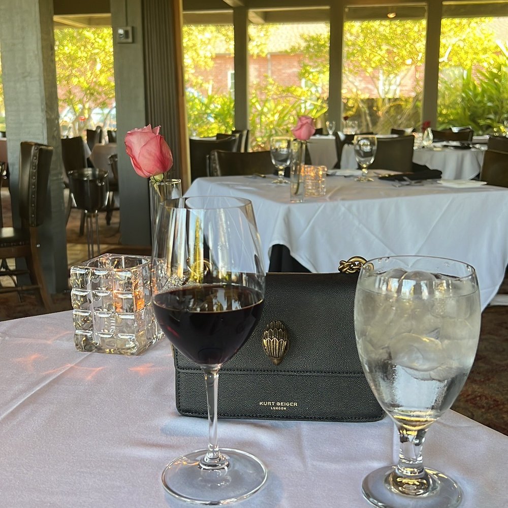 La Truffe Sauvage - two glasses of wine on a table - French Near Me - Lake Charles, Louisiana La Truffe Sauvage - two glasses of wine on a table - French Near Me - Lake Charles, Louisiana