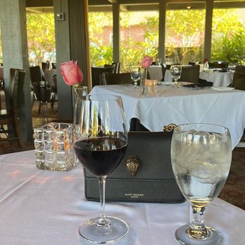La Truffe Sauvage - two glasses of wine on a table - French Near Me - Lake Charles, Louisiana La Truffe Sauvage - two glasses of wine on a table - French Near Me - Lake Charles, Louisiana