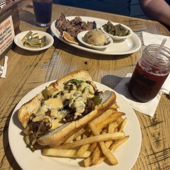 Puckett's Restaurant - philly cheesesteak with fruit tea and the meat & 2 platter - Southern Near Me - Hendersonville, Tennessee Puckett's Restaurant - philly cheesesteak with fruit tea and the meat & 2 platter - Southern Near Me - Hendersonville, Tennessee