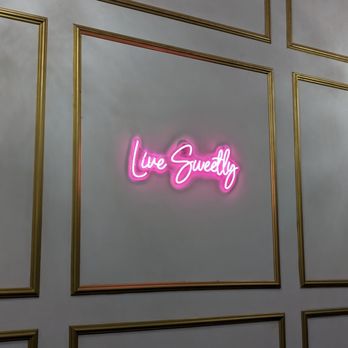 Urban Sweets - a neon sign on a wall - Ice Cream & Frozen Yogurt Near Me Urban Sweets - a neon sign on a wall - Ice Cream & Frozen Yogurt Near Me