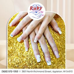 Ruby Nails and Spa - Classic elegance with a touch of floral charm! These white-tipped nails with 3D flower accents are perfect for any special occasion