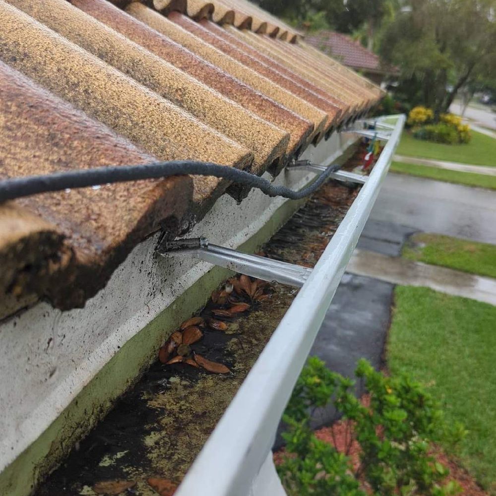 The Brothers that just do Gutters - Gutter was cleaned three weeks ago. But our neighbor has oak tree gets my gutters filled with leaves. - Gutter Services Near Me - St. Johns, Florida The Brothers that just do Gutters - Gutter was cleaned three weeks ago. But our neighbor has oak tree gets my gutters filled with leaves. - Gutter Services Near Me - St. Johns, Florida
