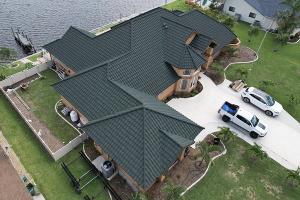 Trademark Roofing Logo