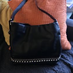 Shoe Service & Alterations - New Brighton Purse. I would like change into a crossbody bag. Would you be able to take handles off and attach one silver on each side to ho