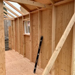 The shed is built on-site with care.