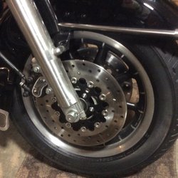 Redline Cycle - New front tire, dual floating discs, wheel bearings and rebuilt calipers