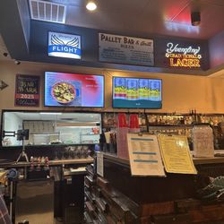 Pallet Bar & Grill - Bar and kitchen area