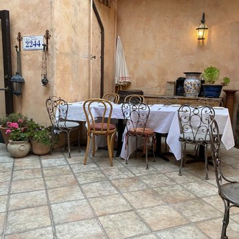 Via Veneto - a patio with tables and chairs - Italian Near Me - San Francisco, California Via Veneto - a patio with tables and chairs - Italian Near Me - San Francisco, California