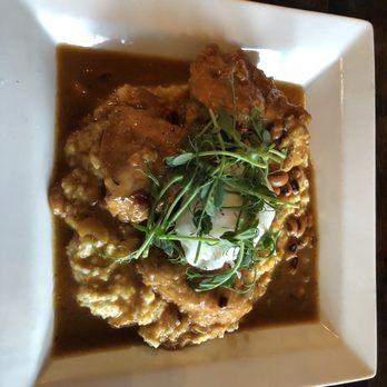 Skillet - Fried chicken over grits - New American Near Me - Columbus, Ohio Skillet - Fried chicken over grits - New American Near Me - Columbus, Ohio