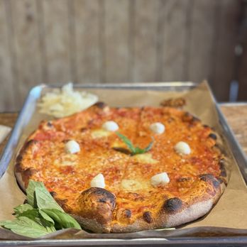 The Gypsy Poet - Margherita "The Queen" cooked to perfection. - Pizza Near Me - Houston, Texas The Gypsy Poet - Margherita "The Queen" cooked to perfection. - Pizza Near Me - Houston, Texas