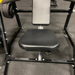 Gold's Gym - As you can see new equipment seat doesn't even work. Doesn't go up or down.