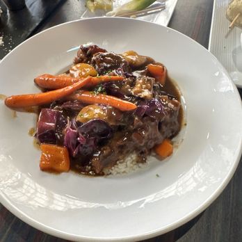 Sisserou's Caribbean Restaurant & Catering - Stewed Oxtail - Caribbean Near Me - Tulsa, Oklahoma Sisserou's Caribbean Restaurant & Catering - Stewed Oxtail - Caribbean Near Me - Tulsa, Oklahoma