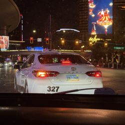 Western Cab Company - Teach your drivers how to drive!!! This idiot merged into turning lane and blew through a red light... putting people in danger!!!