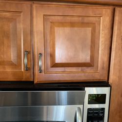 Lighthouse Vacations - Cabinet door off hinge
