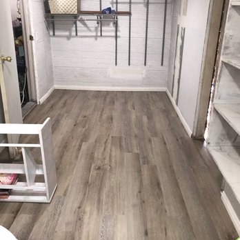 Schmidt's Flooring - a bathroom with a toilet and shelves - Flooring Near Me - Rancho Cucamonga, California Schmidt's Flooring - a bathroom with a toilet and shelves - Flooring Near Me - Rancho Cucamonga, California