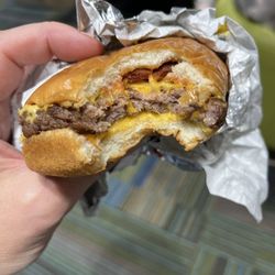 Wendy's - A Baconator is 2 Patties (1/2lb) 6 pieces of bacon & all the fixings. Their version is 1 patty (1/4lb) , 1 piece of bacon & zero fixing.