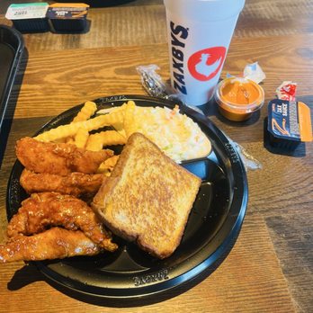 Zaxbys - A Zaxby's meal includes chicken wings, crinkle-cut fries, toasted bread, coleslaw, and a large soft drink in a branded cup. - Chicken Wings Near Me - Saint Johns, Florida