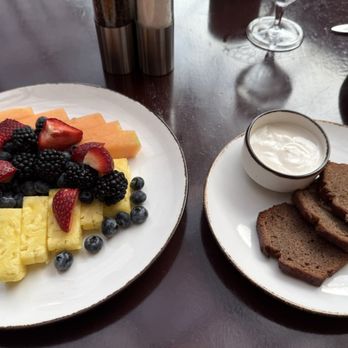 M Bistro - Fruit platter was served with banana bread and a yogurt dip - New American Near Me - New Orleans, Louisiana M Bistro - Fruit platter was served with banana bread and a yogurt dip - New American Near Me - New Orleans, Louisiana