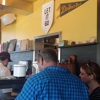 Fishing With Dynamite - This relatively small place is jam packed during lunch even on a Monday! I love those 2 banners on the wall! - Seafood Near Me - Manhattan Beach, California