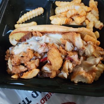 Zaxbys - Crispy Chicken Philly with fries. - Chicken Wings Near Me - Louisville, Kentucky Zaxbys - Crispy Chicken Philly with fries. - Chicken Wings Near Me - Louisville, Kentucky