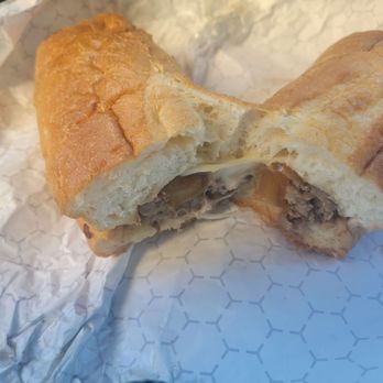 Philly's Best - The inside of a Philly cheese steak sandwich. - Cheesesteaks Near Me - Long Beach, California