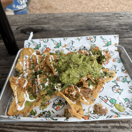 Nachos plate with added guac Nachos plate with added guac