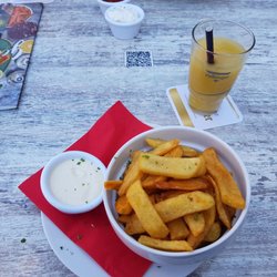 M-ONE Celle - Steakhouse Fries mit Source Cream Dip + Ananassaft 0,2